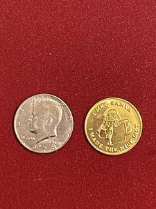 North Pole Bank Coin Exchange! A 1/2 dollar changes to a gold Christmas coin!!