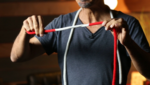 Amazing Acrobatic Knot w/xtra knot Red and White (Gimmicks and Online Instructions) by Daryl